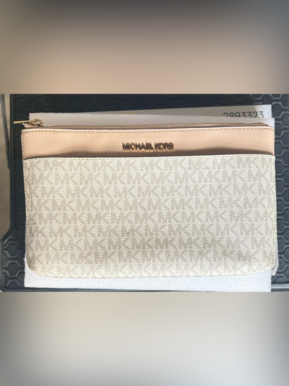 MK Clutch with strap. Never used.